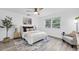 Inviting bedroom with neutral colors, wood-look floors, and a comfortable sitting area at 2900 45Th S St # 26, Gulfport, FL 33711