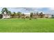 Beautiful building with manicured lawn and tropical landscaping at 2900 45Th S St # 26, Gulfport, FL 33711