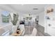 Open-concept living room filled with natural light from large windows and neutral decor at 2900 45Th S St # 26, Gulfport, FL 33711