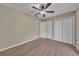 Bedroom with closet and ceiling fan at 302 Old Mulrennan Rd, Valrico, FL 33594