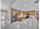 Bright kitchen featuring stainless steel appliances and ample counter space at 302 Old Mulrennan Rd, Valrico, FL 33594