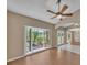Living room with large bay windows and wood floors at 302 Old Mulrennan Rd, Valrico, FL 33594