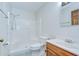 Bathroom featuring a shower, toilet and vanity with sink at 3125 S Miller Rd, Valrico, FL 33596