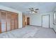 Living space featuring carpet floors, a closet, and natural light at 3125 S Miller Rd, Valrico, FL 33596