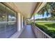 Inviting porch offers a relaxing spot with views of the lush surroundings at 3125 S Miller Rd, Valrico, FL 33596