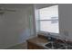 Bright kitchen area with double sink, granite counters and lots of natural light at 3131 Melton N St, St Petersburg, FL 33704