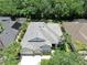 Lovely home featuring a well-manicured lawn, mature landscaping, and an attached two-car garage at 3506 Cordgrass Dr, Valrico, FL 33596
