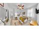 Cozy bedroom features a ceiling fan, window and comfortable, neutral decor at 3506 Cordgrass Dr, Valrico, FL 33596