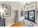 Stylish foyer showcasing hardwood floors, a decorative rug, and an elegant grandfather clock at 3506 Cordgrass Dr, Valrico, FL 33596