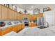 Well-equipped kitchen with granite countertops, stainless steel appliances, and ample cabinet space at 3506 Cordgrass Dr, Valrico, FL 33596