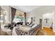 Elegant living room with modern decor, stylish furniture, and sliding glass doors to a patio area at 3506 Cordgrass Dr, Valrico, FL 33596
