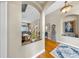 Open-concept space with archway leading to living and foyer at 3506 Cordgrass Dr, Valrico, FL 33596