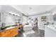 Light-filled main bathroom featuring double sinks, soaking tub, and glass enclosed shower at 3506 Cordgrass Dr, Valrico, FL 33596