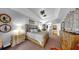 Comfortable main bedroom with neutral color scheme, tray ceiling and carpet at 3506 Cordgrass Dr, Valrico, FL 33596