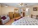 Bedroom featuring wood furniture, and a comfortable seating area at 37821 Willingham Ave, Dade City, FL 33525