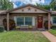 Close up of charming home entrance featuring decorative details and brick facade at 37821 Willingham Ave, Dade City, FL 33525