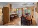 Eat in kitchen with wooden cabinets and an island with bar stool seating at 37821 Willingham Ave, Dade City, FL 33525