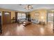 Bright and airy living room with hardwood floors and ample natural light at 37821 Willingham Ave, Dade City, FL 33525