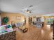 Spacious living room featuring hardwood floors and open concept design at 37821 Willingham Ave, Dade City, FL 33525