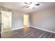 Bedroom showcases sleek floors, ceiling fan, and closet access with a well-lit interior at 3805 Cortez Cir # B, Tampa, FL 33614
