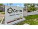 Exterior shot of community entrance sign with landscaping at 3805 Cortez Cir # B, Tampa, FL 33614