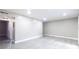 Bright living room with modern flooring, recessed lighting, and a neutral color palette for a contemporary feel at 3805 Cortez Cir # B, Tampa, FL 33614