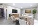 Staged living room featuring modern furnishings, neutral decor, and an open design for comfortable living at 3805 Cortez Cir # B, Tampa, FL 33614