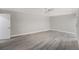 Spacious bedroom with light gray walls, wooden flooring, and a ceiling fan at 384 Boca Ciega Point Blvd, St Petersburg, FL 33708