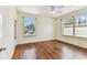 Bedroom with original hardwood floors and natural light at 4435 1St S Ave, St Petersburg, FL 33711