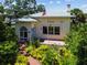 Charming exterior of home surrounded by well-maintained landscaping at 4435 1St S Ave, St Petersburg, FL 33711