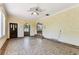 Open living space with archway details and unique tiled floors, blending classic charm with functional design at 4435 1St S Ave, St Petersburg, FL 33711