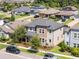 Two-story home featuring well-maintained landscaping, neutral color palette, and a two car garage at 4465 Tubular Run, Land O Lakes, FL 34638