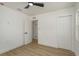 This bedroom features light wood floors, a closet and access to a private bathroom at 463 85Th Ave, St Pete Beach, FL 33706