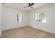 Bright bedroom with hardwood floors, white walls, and natural light creating a serene space at 463 85Th Ave, St Pete Beach, FL 33706