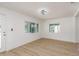 Bright and airy living room with hardwood floors and plenty of natural light at 463 85Th Ave, St Pete Beach, FL 33706