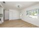 Spacious living area with hardwood floors, neutral walls, and natural light throughout at 463 85Th Ave, St Pete Beach, FL 33706