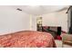 Spacious bedroom featuring closet access and tiled floors at 5128 Billings Dr, Holiday, FL 34690