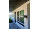 Close-up showcasing the home's freshly painted exterior, modern windows, and updated fixtures at 5627 Commonwealth N Ave, St Petersburg, FL 33703