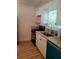 Updated kitchen with granite countertops, stainless steel sink, and newer appliances at 5627 Commonwealth N Ave, St Petersburg, FL 33703