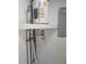 Water heater and electrical panel showcasing modern installation and wiring at 5627 Commonwealth N Ave, St Petersburg, FL 33703