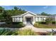 Charming community center with stone accents, landscaped grounds, and a welcoming entrance at 5927 Flatwoods Manor Cir, Lithia, FL 33547