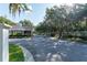 Community entrance gate with guard house at 5927 Flatwoods Manor Cir, Lithia, FL 33547