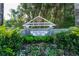 Landscaped entrance sign to Fish Hawk Trails community at 5927 Flatwoods Manor Cir, Lithia, FL 33547