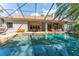 Resort-style pool featuring ample seating and direct access to the home at 5927 Flatwoods Manor Cir, Lithia, FL 33547