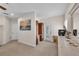 A spacious room with desk, large picture, and view to the outside at 6207 Bleeker St, Riverview, FL 33578