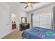 This bright bedroom includes a glimpse of a bathroom at 6207 Bleeker St, Riverview, FL 33578