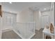 Upstairs hallway with carpet flooring and white doors at 6207 Bleeker St, Riverview, FL 33578