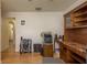 Bright office features wood floors, built-in shelving, and plenty of space for a desk and other furniture at 6351 Desert Peace Ave, Land O Lakes, FL 34639