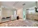 Renovated kitchen area with tile floors, an open layout, and access to additional rooms at 6730 10Th Avenue S Ter, St Petersburg, FL 33707