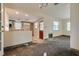 Remodeled kitchen featuring white cabinets, and space for appliances and bar top seating at 6730 10Th Avenue S Ter, St Petersburg, FL 33707